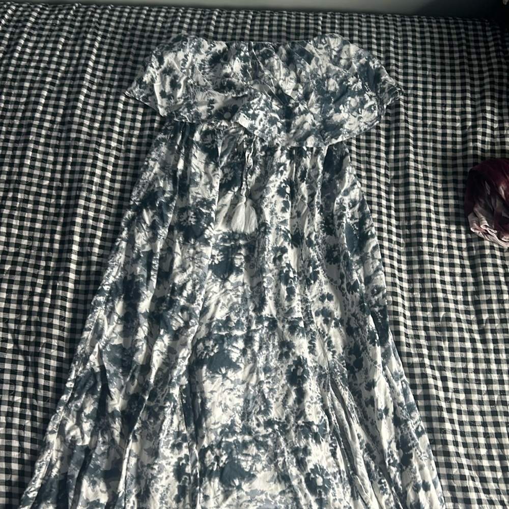 A strapless blue and white tie dye dress